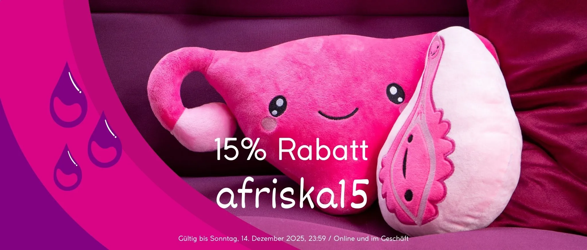 Foto von Fuchsia Kissen und einer pinken Plüsch-Bebärmutter une einer pinken Vulva mit einem Rabattcode von 15%