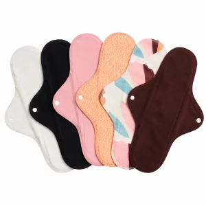 Set de trois serviettes hygiéniques lavables Imse en coton biologique, modèles Maxi pour flux abondant, dépliées